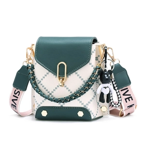 Quilted crossbody phone bag in green and beige leather with chain and teddy charm