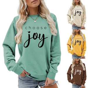 Multiple colors of women's crewneck sweatshirts featuring 'choose joy' printed slogan
