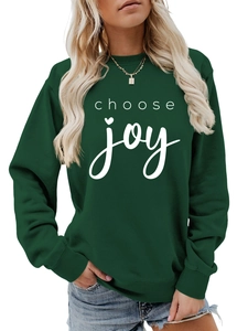 Detail of white Choose Joy script and heart print on dark green crewneck sweatshirt