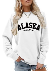 Detail of white round neck sweatshirt featuring Alaska mountain graphic and ribbed cuffs