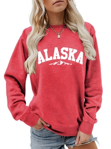 Detail of red Alaska graphic sweatshirt featuring soft knit fabric and crew neck design