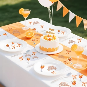 Rose gold Happy Birthday confetti with cocktail icons on a decorated party table