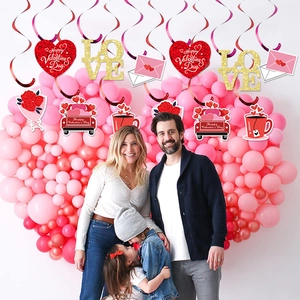 Romantic Valentine's Day spiral ornaments and hanging cards with heart festive decor