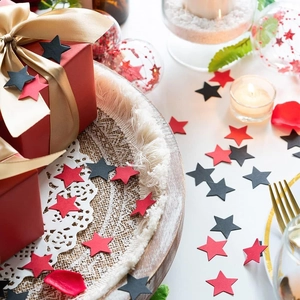 Confeti de papel en forma de estrella roja y negra para decoración de mesas de fiesta