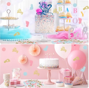Close-up of Oh Baby gold glitter confetti and He or She cake toppers for reveal parties