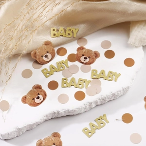 Baby shower bear confetti featuring gold glitter BABY text and teddy bear paper cutouts