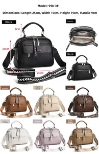 Détails du sac bandoulière pour femme avec dimensions et large sangle à motifs ondulés