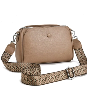 Khaki pebbled leather pillow bag with colorful ethnic style wide shoulder strap