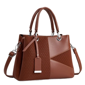 Brown faux leather tote bag with woven texture, double handles and crossbody strap