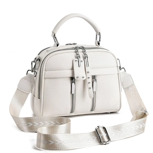 Chic white lychee leather handbag with double zippers and wide woven geometric shoulder strap
