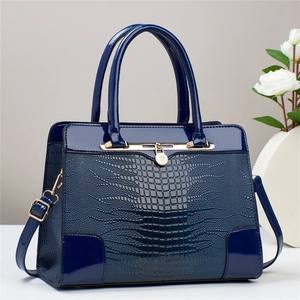 Dark blue crocodile pattern handbag for women with glossy finish and gold metal buckle