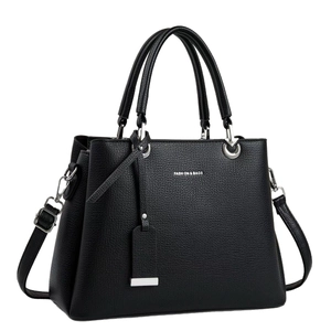 Elegant black lychee texture handbag with white lettering and silver hardware detail