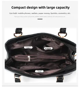 Detailed interior of black PU leather tote showing compartments and zipper pockets