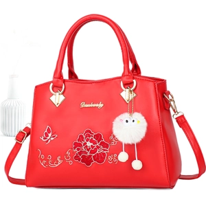 Elegant red embroidered handbag with peony pattern, top handle and crossbody strap