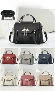 Litchi pattern PU leather handbag shown in seven colors with swan logo and size specs