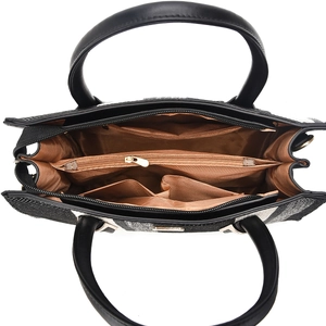 Detailed interior of striped tote bag showing compartments and brown polyester lining