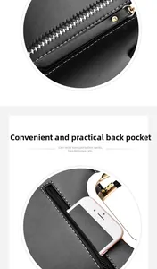 Detail of black leather handbag featuring a back zipper pocket for phone and small items