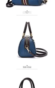 Detail view of woven leather Boston bag featuring navy blue finish and tricolor web stripe