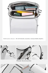 Internal multi-layer storage of white leather crossbody bag with hardware details