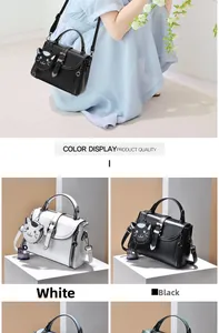 Detail of mini crossbody bag with a cute cat-shaped pendant and adjustable strap