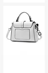 Rear view of white crossbody bag showing functional back pocket and detachable strap