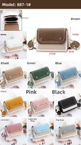 Détails du sac bandoulière bicolore montrant les dimensions 21x14x8cm et compartiments