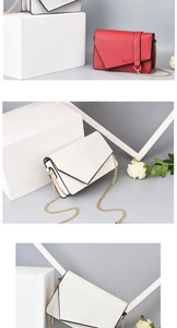 Detail of small V-flap crossbody bags in white and red with gold chain straps