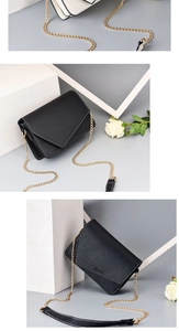 Close-up of minimalist chain shoulder bags in black and cream with refined gold hardware