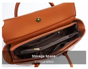 Top view showing the spacious multi-compartment interior and zip pockets of the brown tote bag