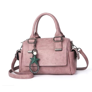 Dusty pink large capacity Boston shoulder bag with top handles and star pendant charm