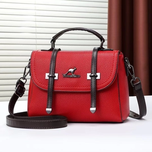 Red lychee texture women's handbag with brown handles and a silver kangaroo logo