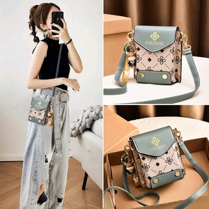 Minimalist mint green and beige crossbody mobile phone bag with golden floral logo accent