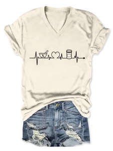 Detail of V-neck T-shirt with Rx heart medical print and distressed denim shorts