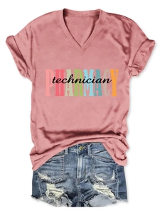 Flat lay of pink V-neck T-shirt with Pharmacy Technician print and distressed denim shorts