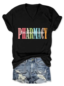 Detailed look at Pharmacy Technician print on black V-neck tee with distressed denim shorts