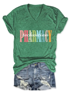 Flat lay of grey green V-neck pharmacy technician T-shirt with denim shorts