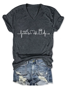Detail of grey V-neck T-shirt with Rx heart EKG medical print and denim shorts