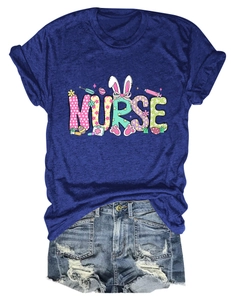 Detail of navy nurse t-shirt with bunny ears and medical elements on casual cotton fabric