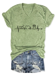 Detail of green V-neck T-shirt with Rx heartbeat and medicine bottle print on heather fabric