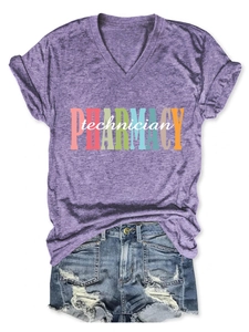 Detailed texture of purple V-neck pharmacy technician T-shirt paired with distressed shorts