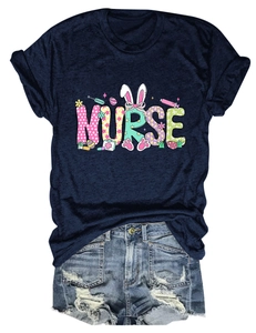 Detail of navy blue nurse Easter t-shirt with colorful bunny ears and medical graphics