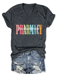 Detailed flat lay of V-neck pharmacy technician tee with distressed denim shorts