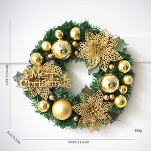 Close-up of 30cm Christmas wreath with gold baubles and Merry Christmas signage