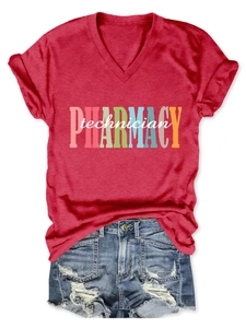 Flat lay of a red V-neck Pharmacy Technician T-shirt with distressed denim shorts