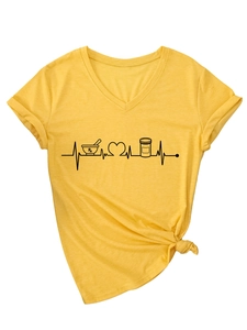 Detail of creative RX heartbeat and medicine bottle print on yellow V-neck t-shirt