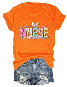 Detail of orange nurse t-shirt with Easter rabbit motifs and distressed denim shorts