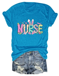Detailed view of Nurse slogan print with bunny ears and medical icons on blue T-shirt