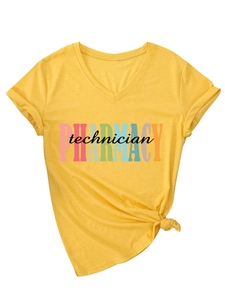 Detail of pharmacy technician mustard yellow V-neck tee with knot tie and cuffed sleeves