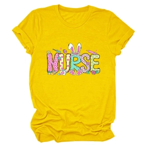 Close-up of bright yellow nurse T-shirt with Easter bunny and medical icons design