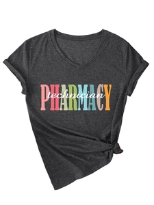 Detail of V-neck pharmacy technician shirt with colorful lettering and a stylish side knot
